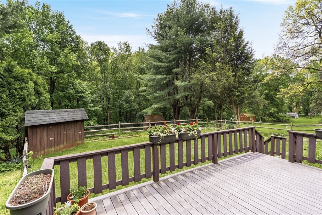 788 Burts Pit Road Northampton, MA 01062 - Photo 40 of 42 a view of deck with furniture and trees around