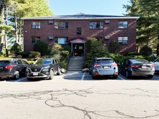 a car parked in front of a building