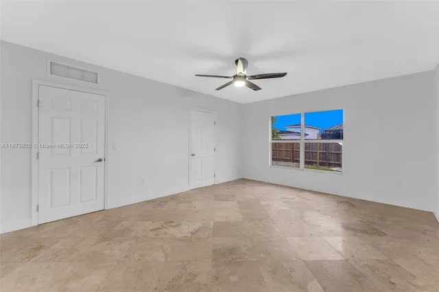 a view of a big room with carpet