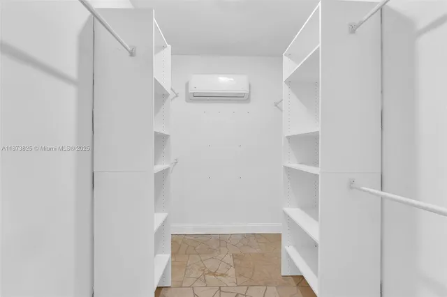 a view of an empty walk in closet