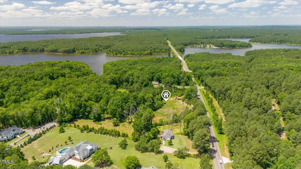 13317 Creedmoor Road Wake Forest, NC 27587 - Photo 3 of 5 a view of a lake with a city