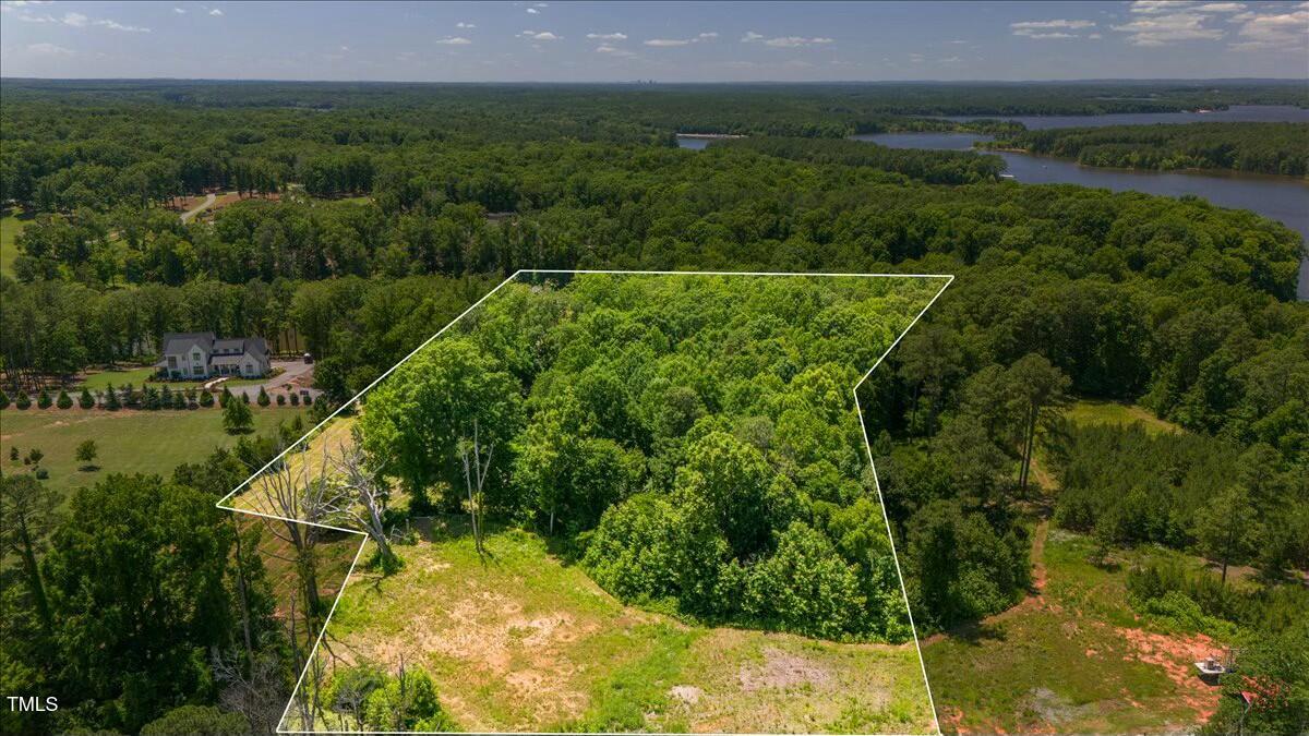 13317 Creedmoor Road Wake Forest, NC 27587 - Photo 4 of 5 a view of a field with a lake view
