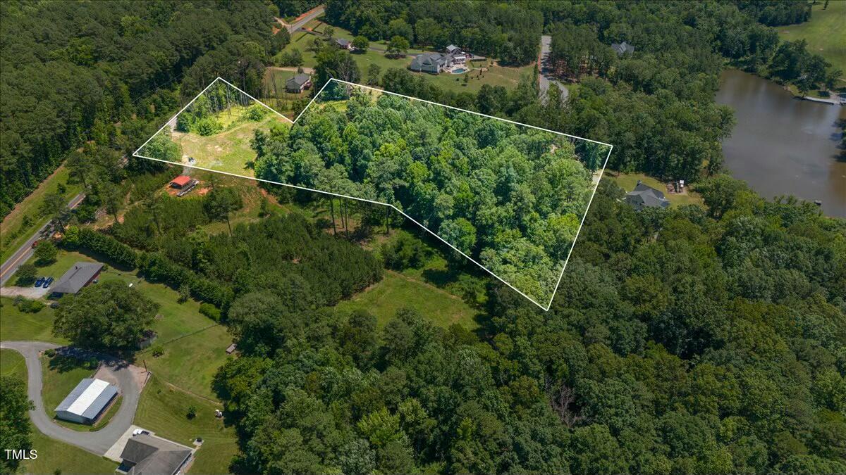 13317 Creedmoor Road Wake Forest, NC 27587 - Photo 5 of 5 an aerial view of a house with a yard