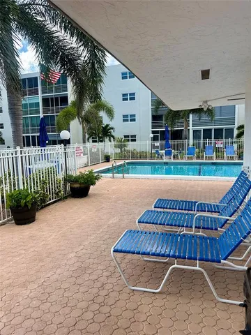 a view of a backyard and a patio