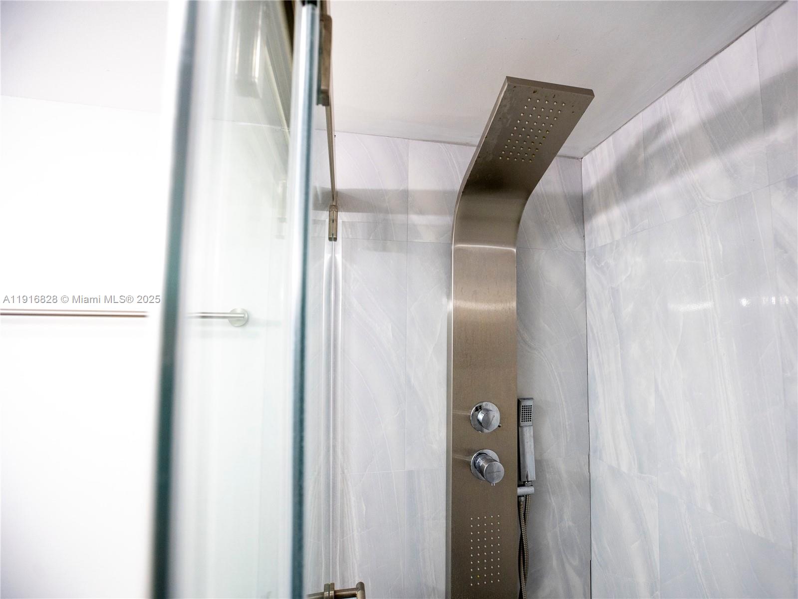 9400 West Flagler Street, Unit 313 Miami, FL 33174 - Photo 21 of 35 a close view of bathroom with shower