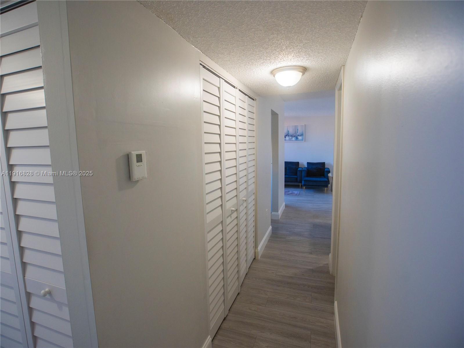 9400 West Flagler Street, Unit 313 Miami, FL 33174 - Photo 27 of 35 a view of a bathroom from the hallway