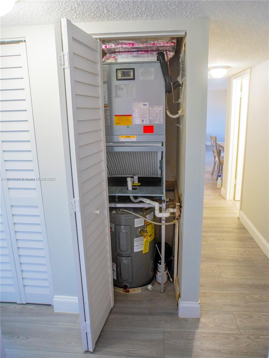 9400 West Flagler Street, Unit 313 Miami, FL 33174 - Photo 29 of 35 a room with storage and utility