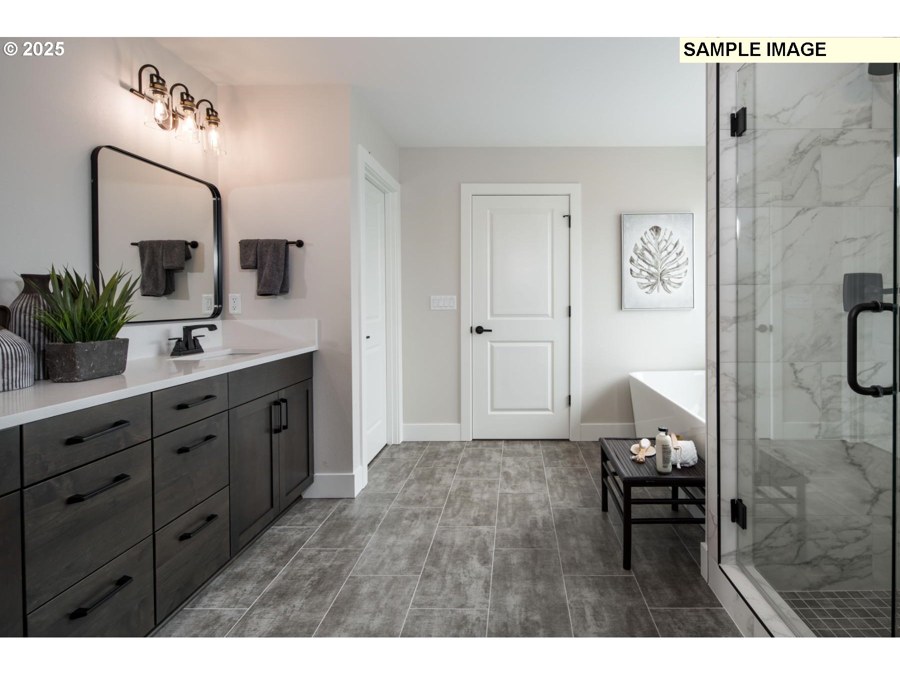 8119 North Hargrave Street Camas, WA 98607 - Photo 16 of 23 a spacious bathroom with a sink and a mirror