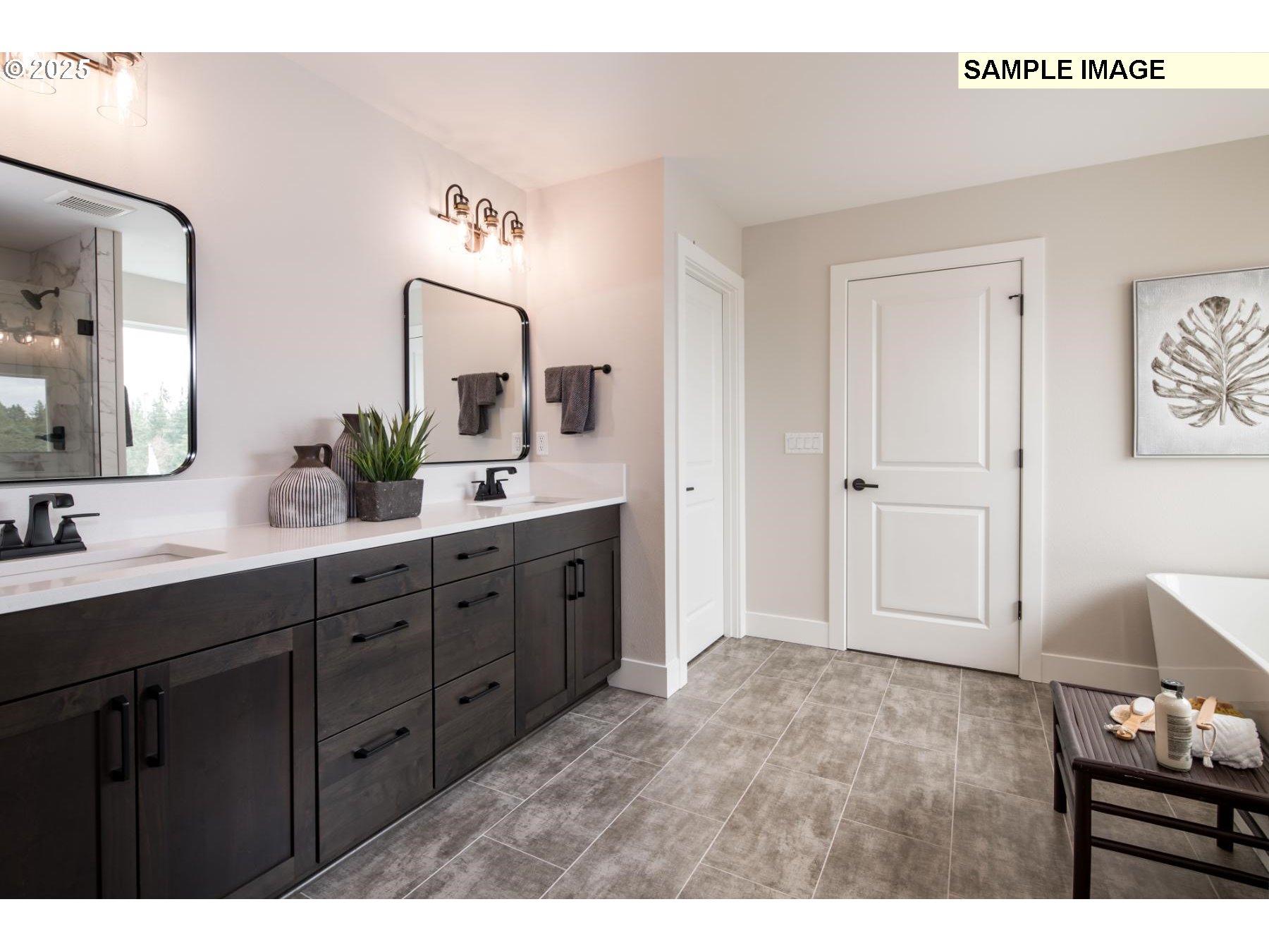 8119 North Hargrave Street Camas, WA 98607 - Photo 17 of 23 a spacious bathroom with a granite countertop sink and a mirror