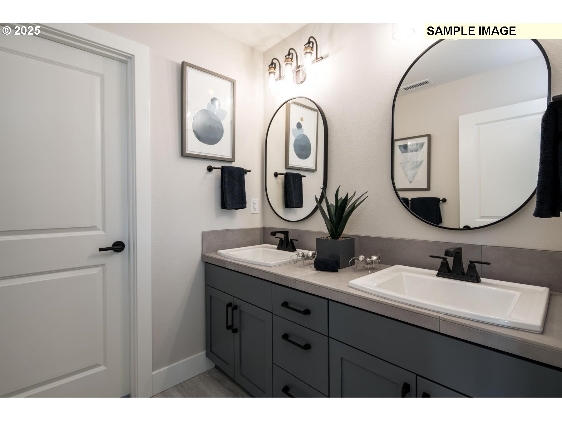 8119 North Hargrave Street Camas, WA 98607 - Photo 21 of 23 a bathroom with 2 sink and a mirror