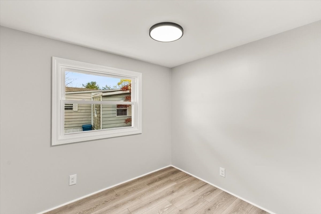 5 Marks Way Carver, MA 02330 - Photo 16 of 23 a view of empty room with wooden floor and fan