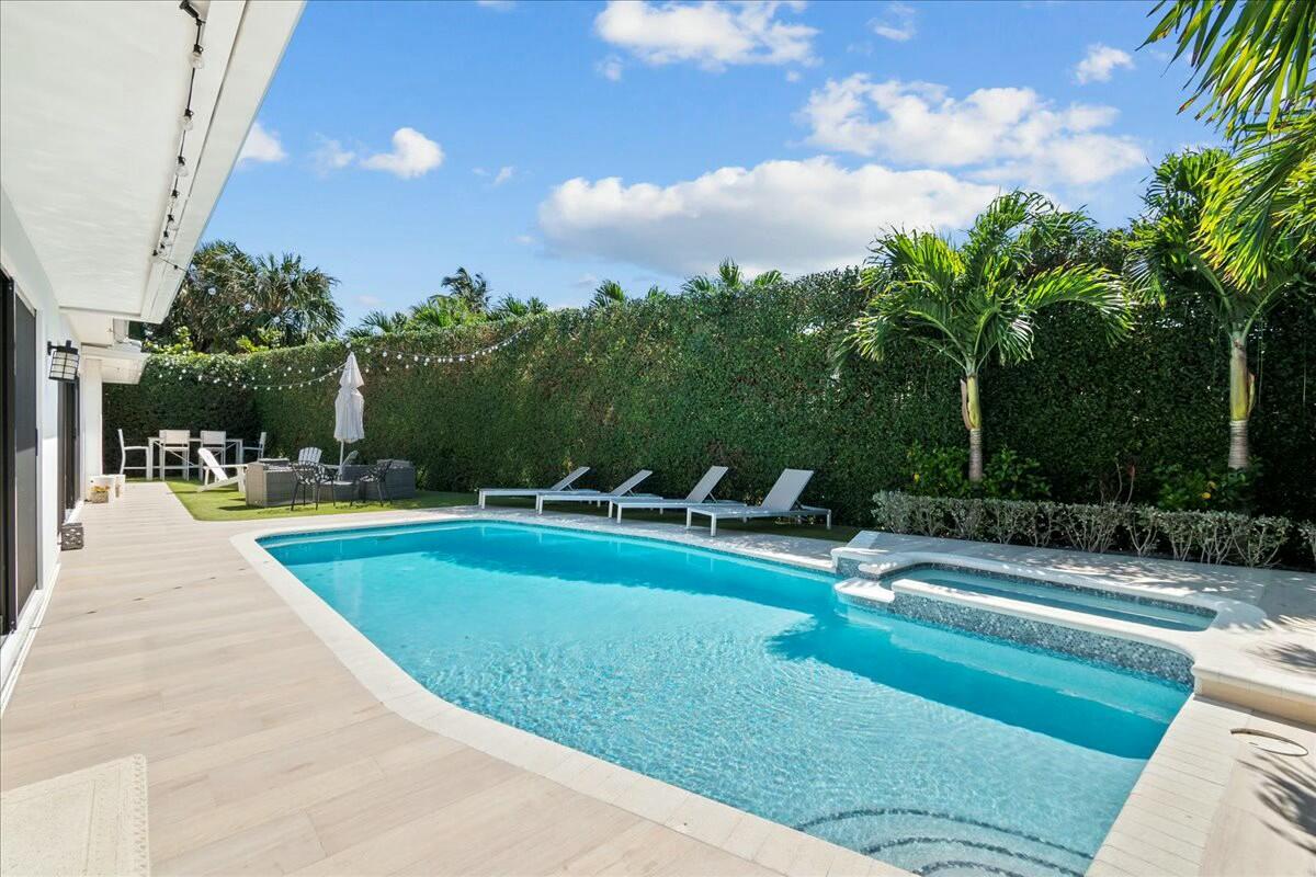 27 Ocean Drive Jupiter, FL 33469 - Photo 14 of 22 a view of swimming pool with seating space