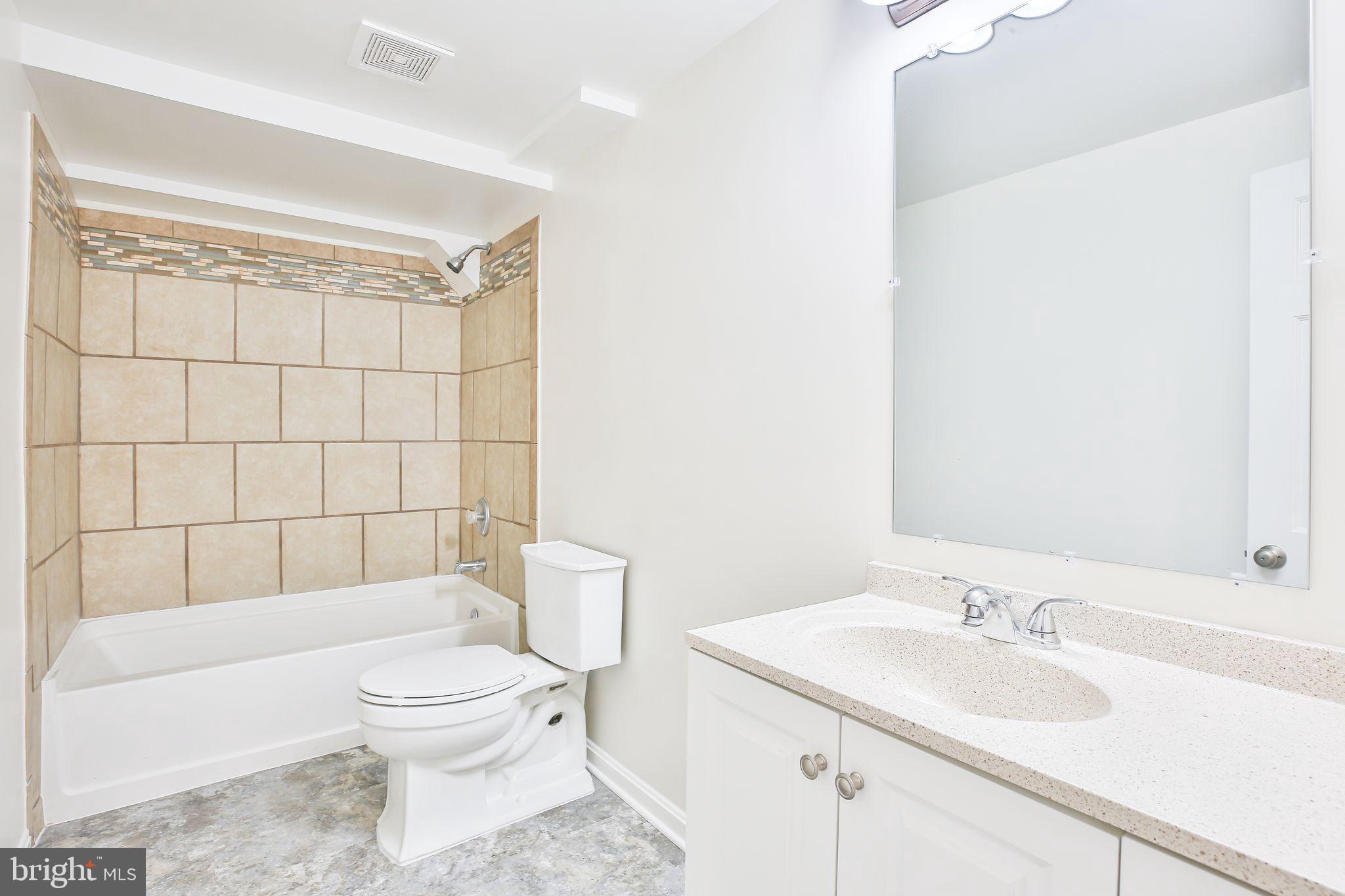 1356 Pierce Road Berryville, VA 22611 - Photo 25 of 45 Lower level bath with custom tile and LVT flooring