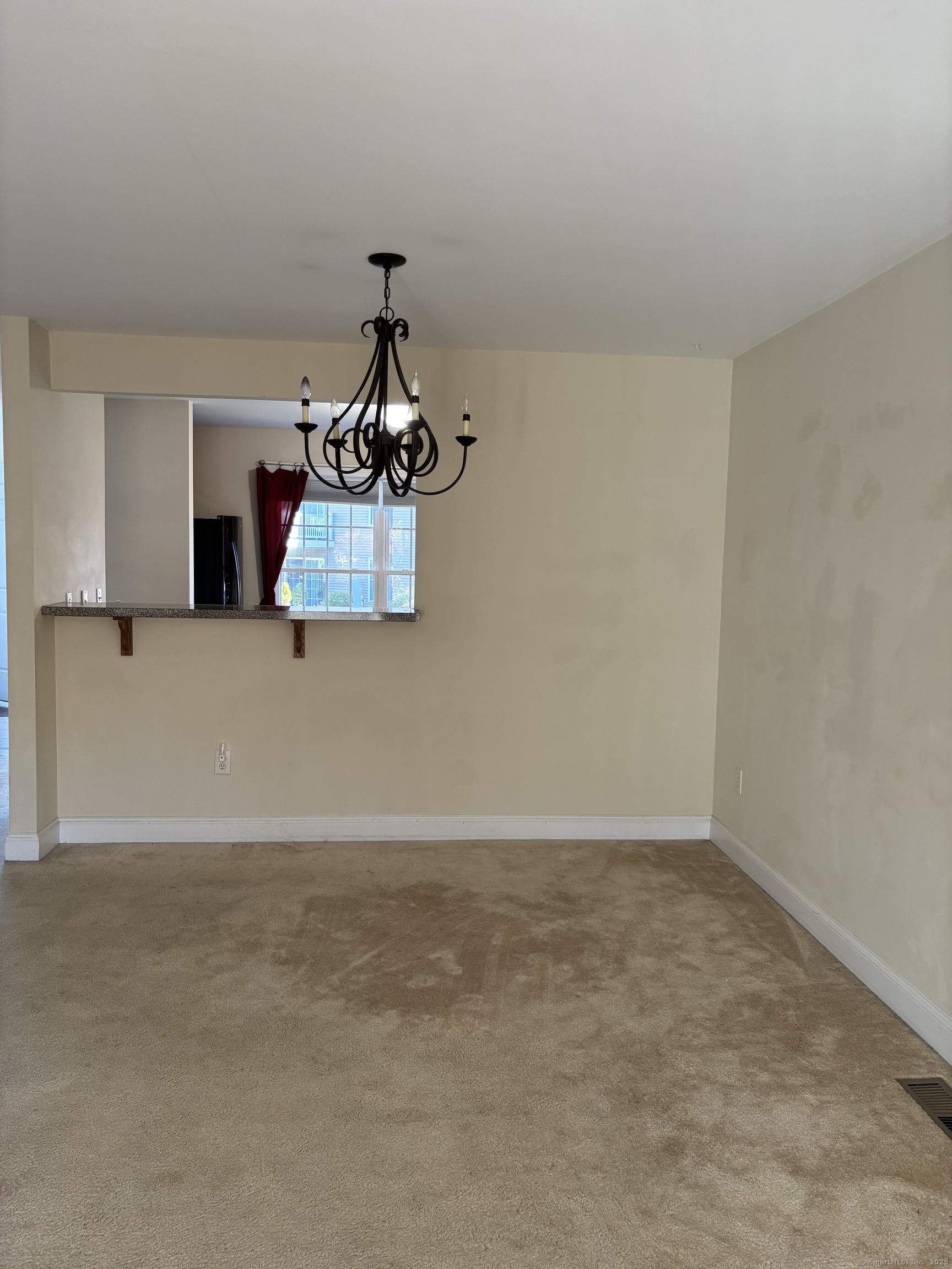 15 Freedom Way, Unit 22 East Lyme, CT 06357 - Photo 11 of 26 a view of a kitchen with kitchen island stainless steel appliances a sink and dishwasher