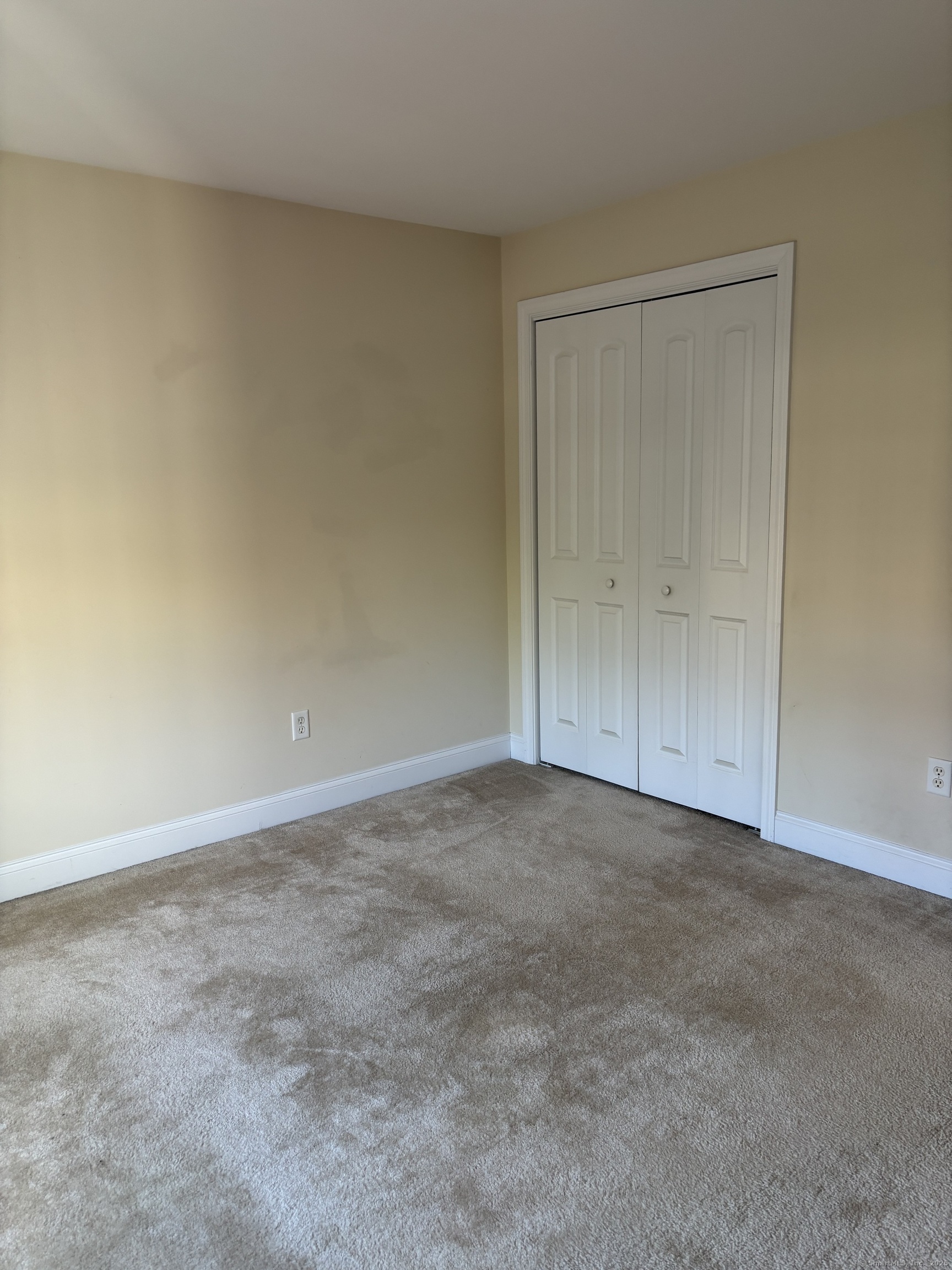 15 Freedom Way, Unit 22 East Lyme, CT 06357 - Photo 15 of 26 a view of an empty room and entryway