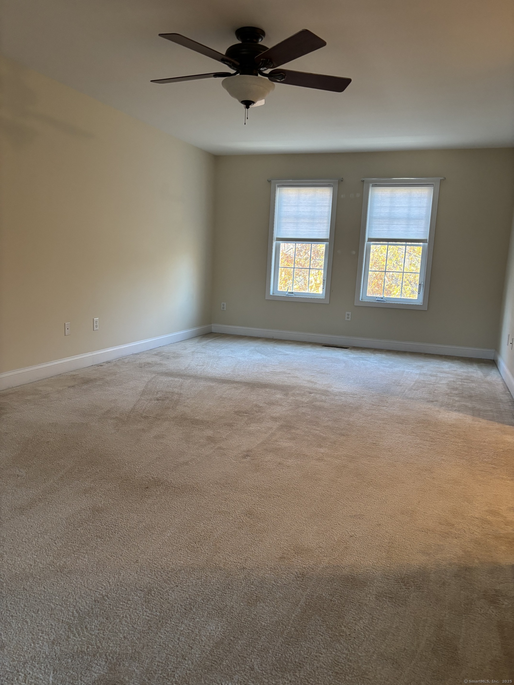 15 Freedom Way, Unit 22 East Lyme, CT 06357 - Photo 21 of 26 a view of an empty room with a window