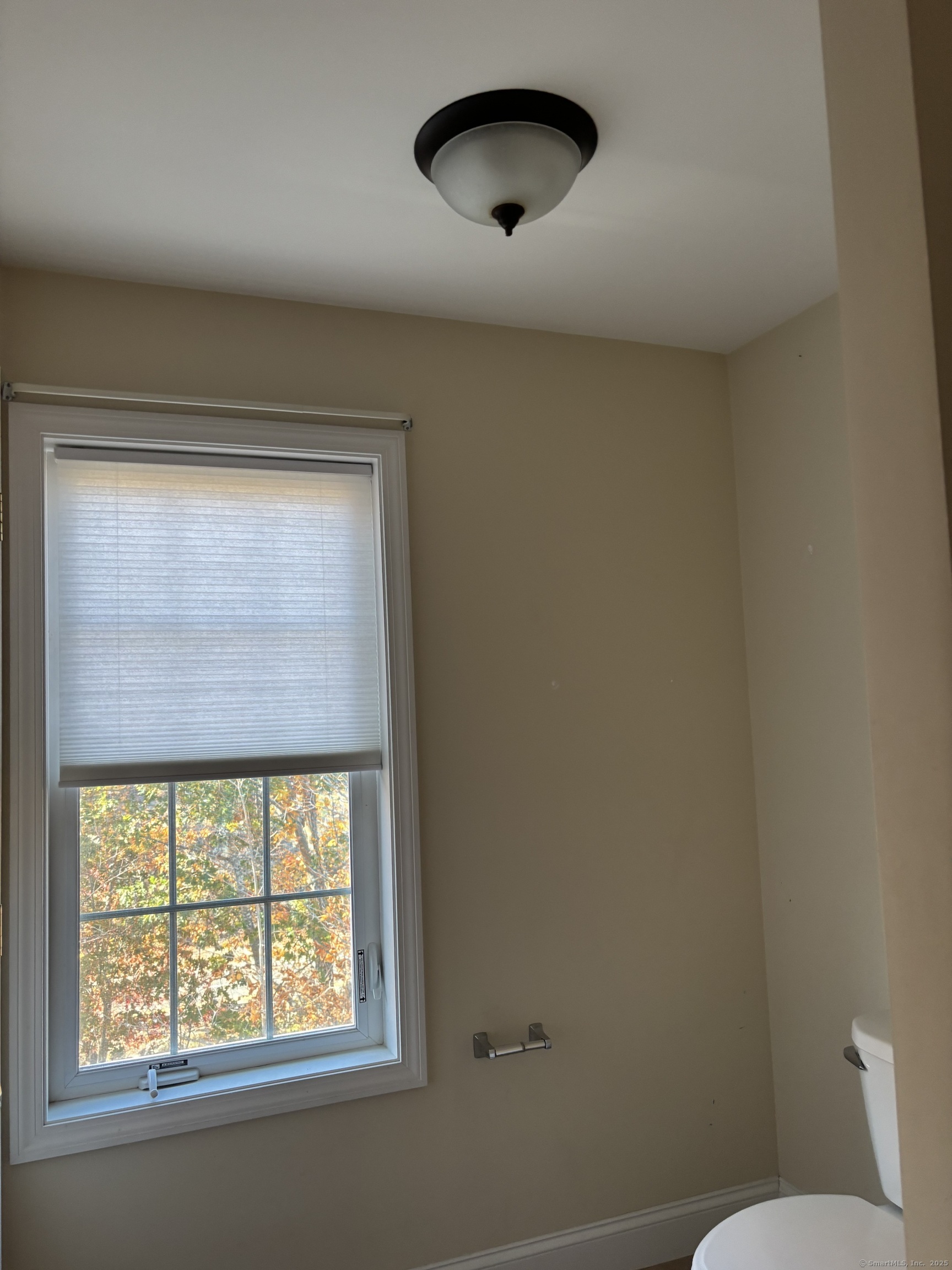 15 Freedom Way, Unit 22 East Lyme, CT 06357 - Photo 24 of 26 an empty room with a window