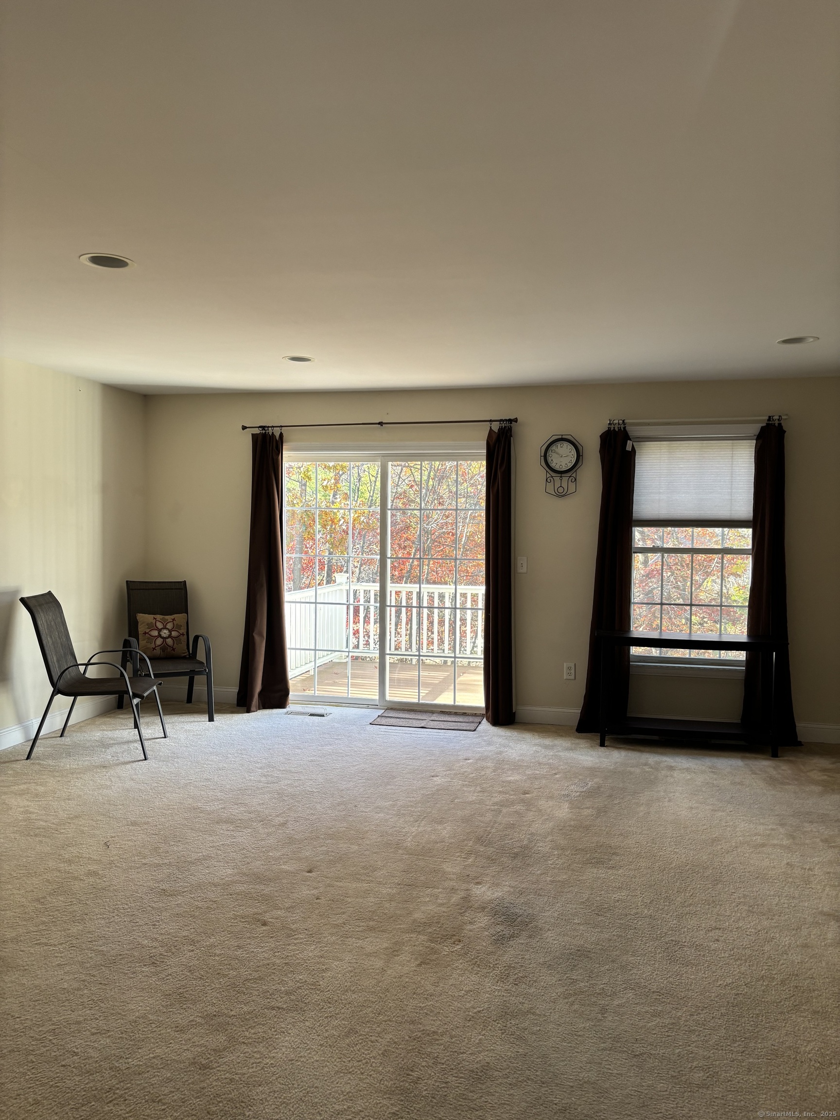 15 Freedom Way, Unit 22 East Lyme, CT 06357 - Photo 7 of 26 a view of an empty room with a window