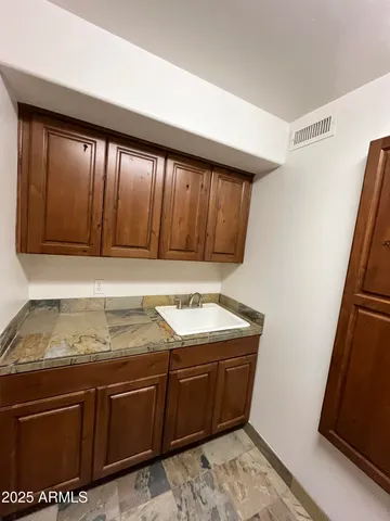 a utility room with washer and dryer