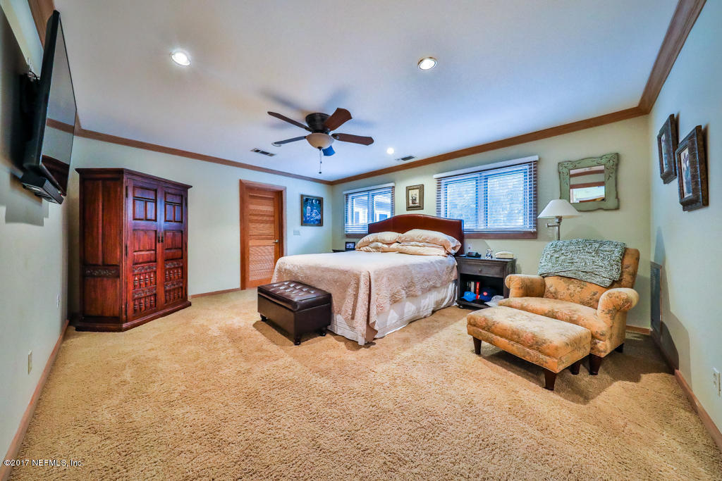 1638 Mandarin Manor Road Jacksonville, FL 32223 - Photo 27 of 53 Ceiling Fan and Carpeted Floors