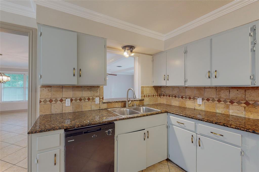 1610 North O'Connor Road Irving, TX 75061 - Photo 11 of 20 a kitchen with sink and cabinets