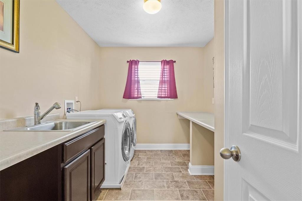 101 Naughton Circle Evans City, PA 16033 - Photo 19 of 25 a kitchen with a sink and a vanity