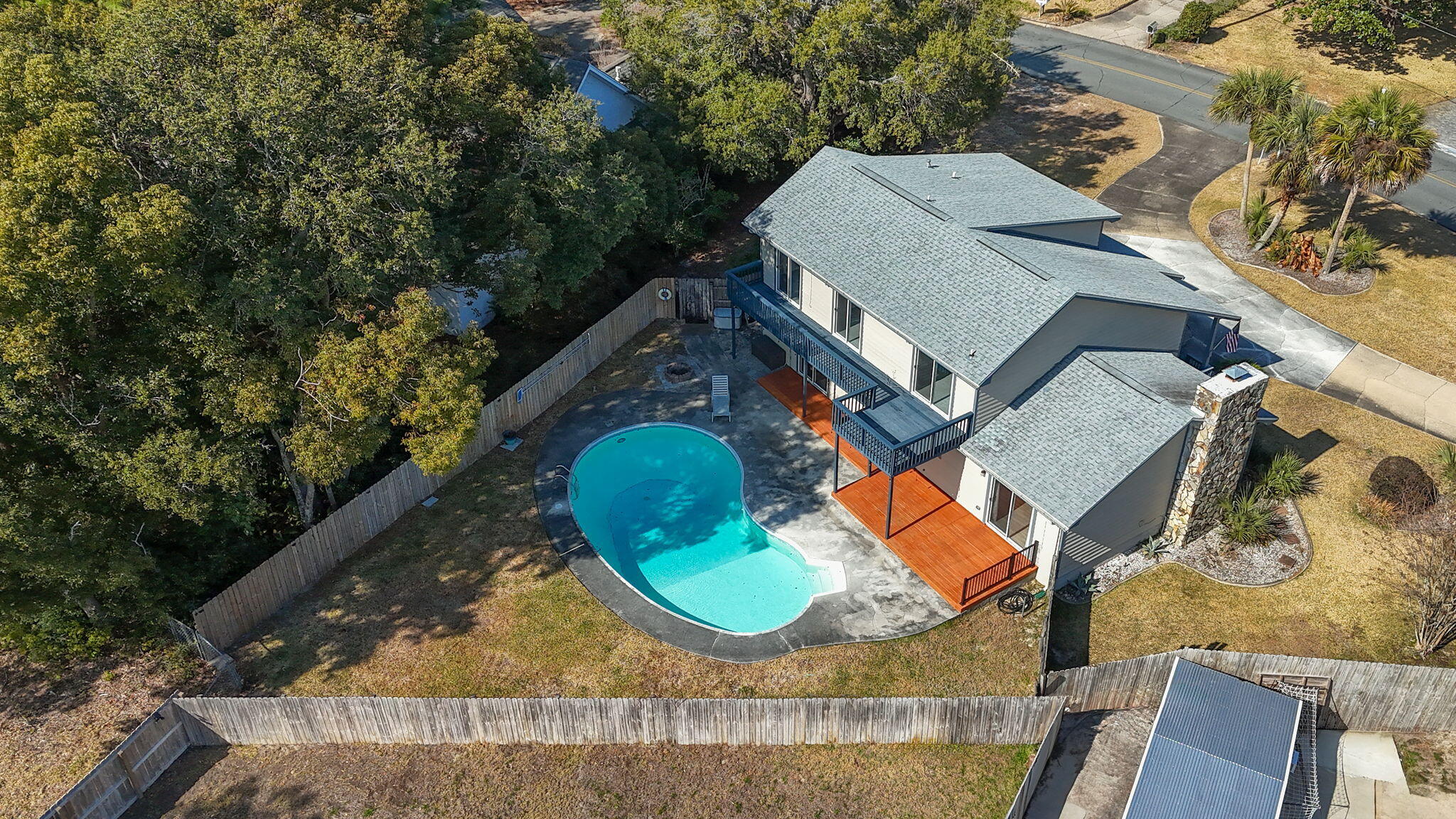54 Country Club Road Shalimar, FL 32579 - Photo 1 of 58 an aerial view of a house with swimming pool and outdoor space