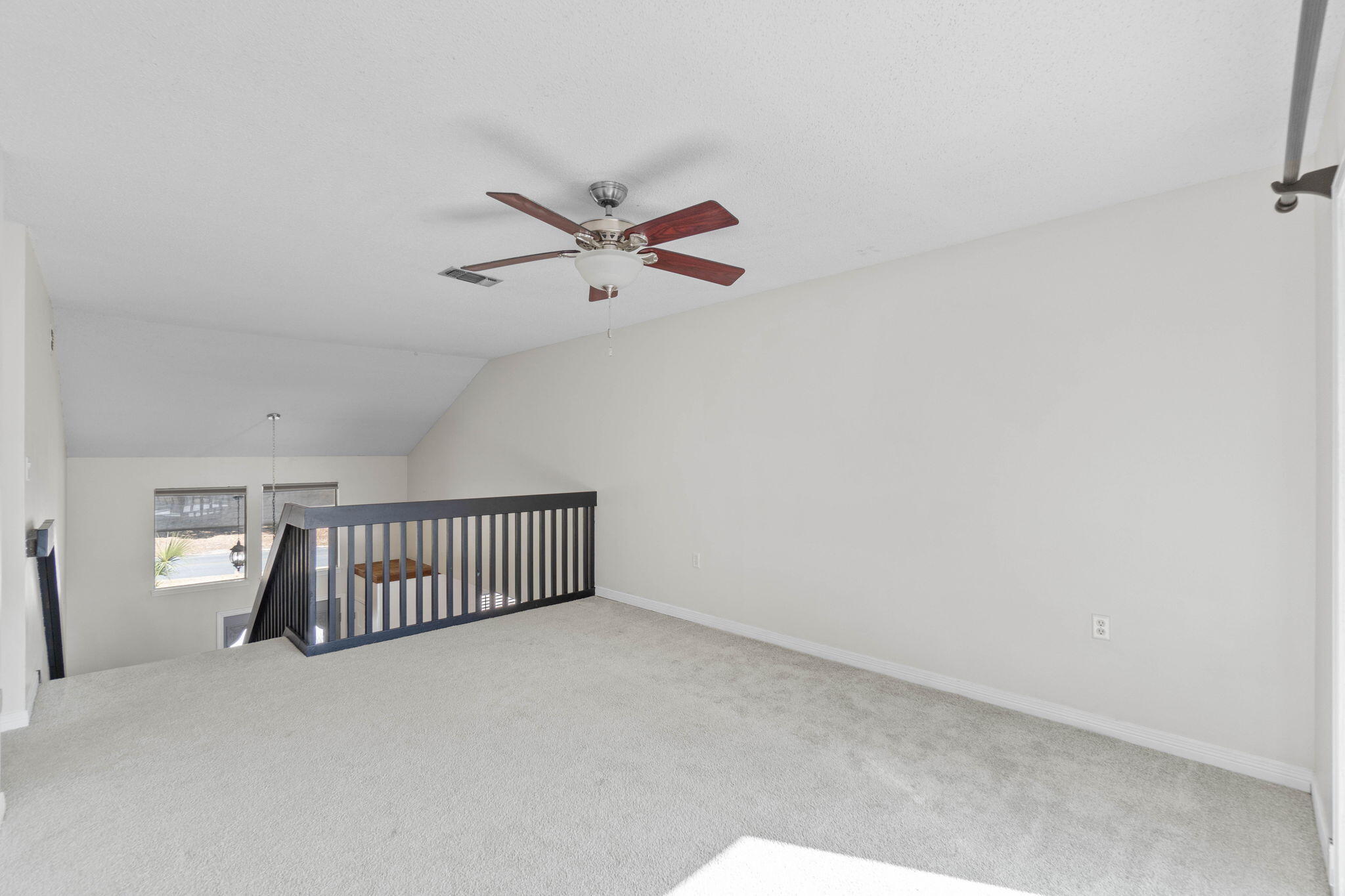 54 Country Club Road Shalimar, FL 32579 - Photo 23 of 58 a view of an empty room with a window