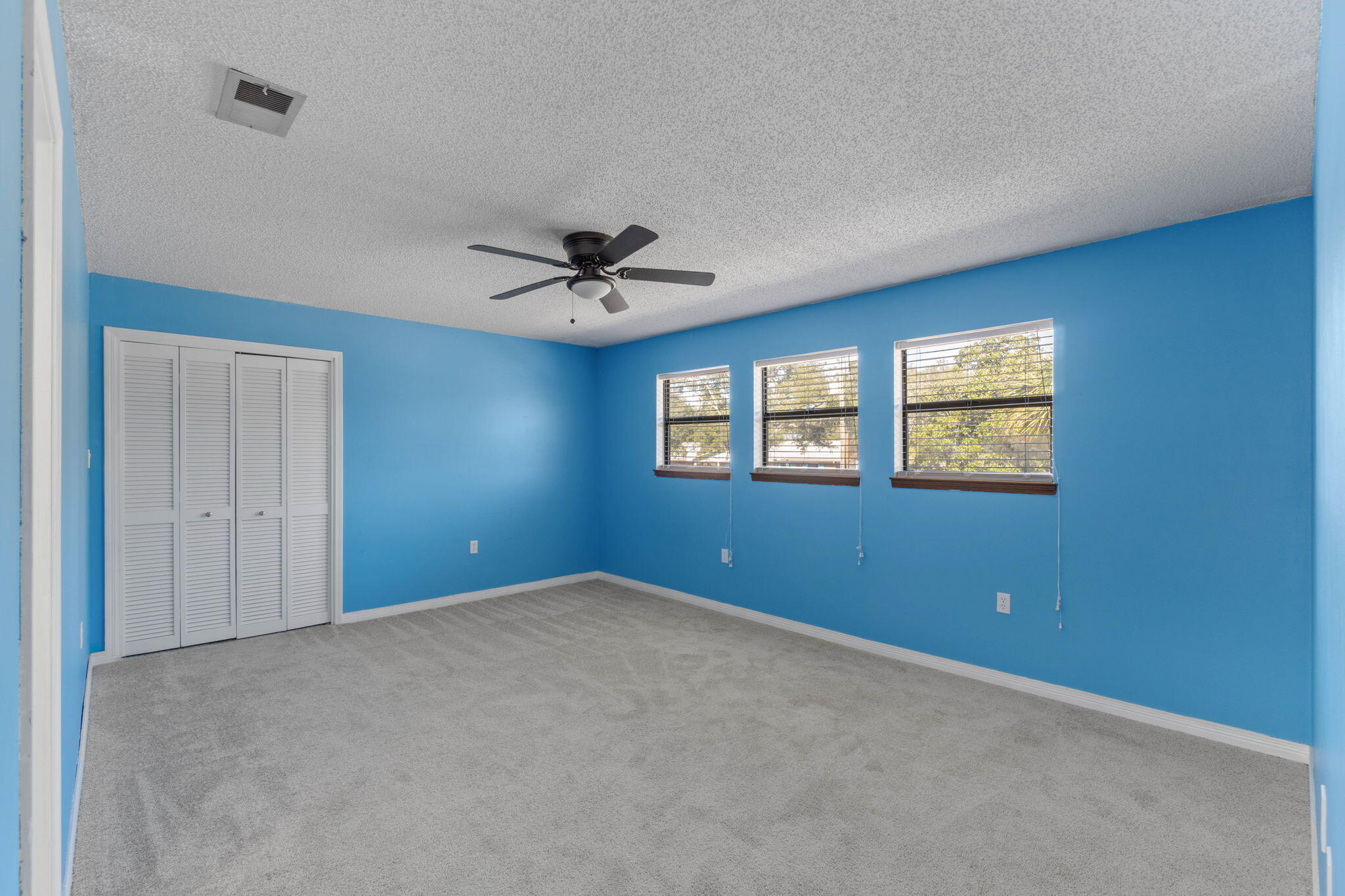 54 Country Club Road Shalimar, FL 32579 - Photo 29 of 58 a view of an empty room with a window