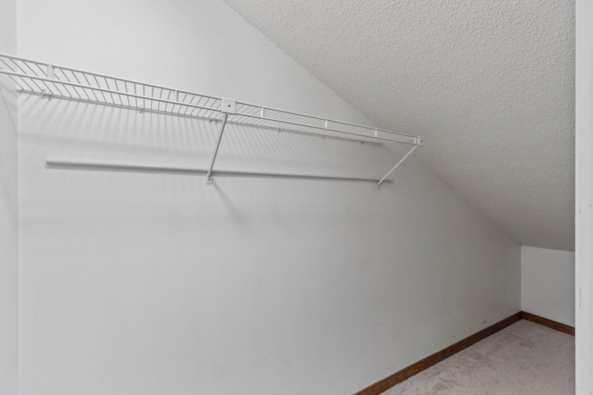 54 Country Club Road Shalimar, FL 32579 - Photo 30 of 58 a view of a room with racks on the wall