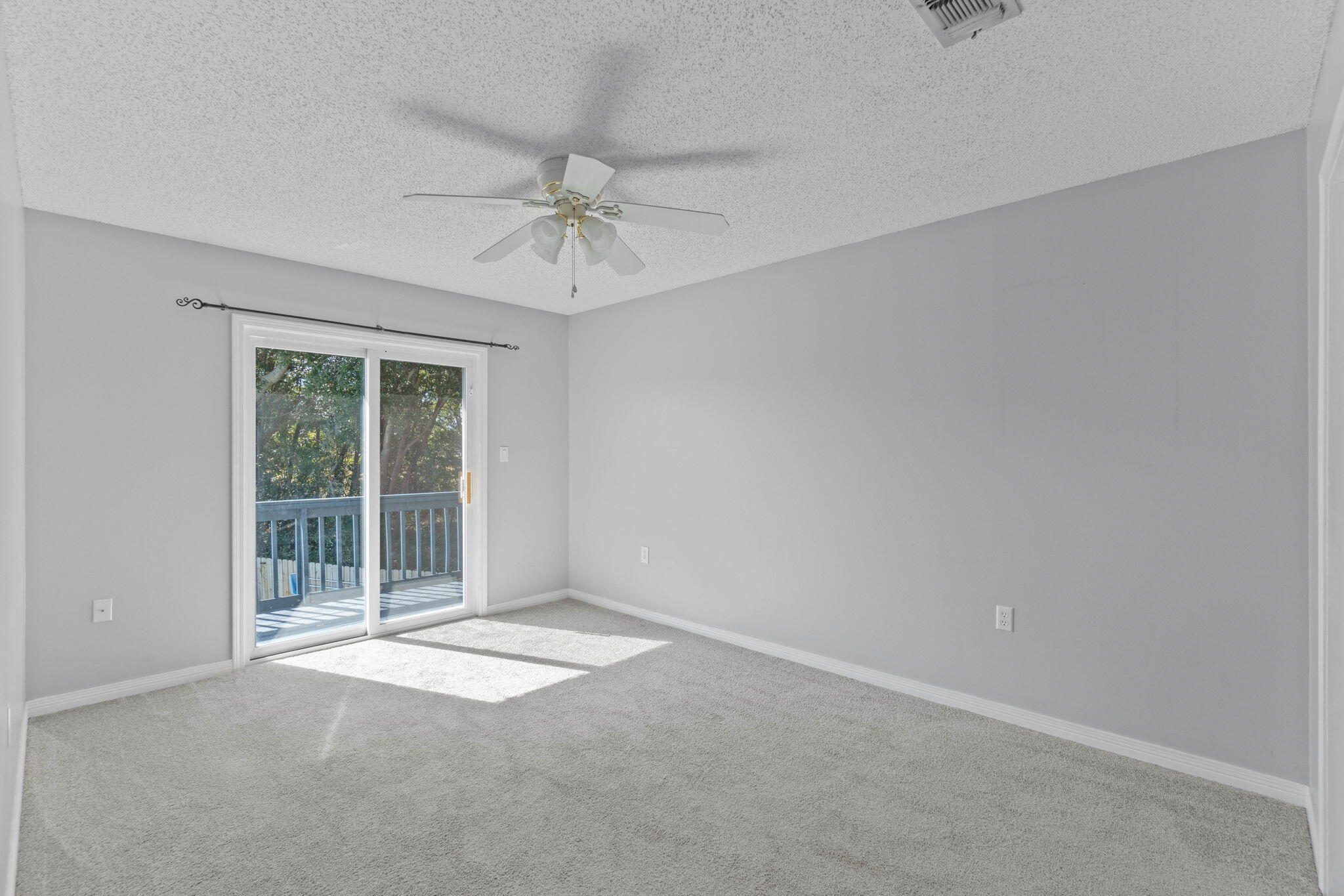 54 Country Club Road Shalimar, FL 32579 - Photo 31 of 58 a view of an empty room with a window