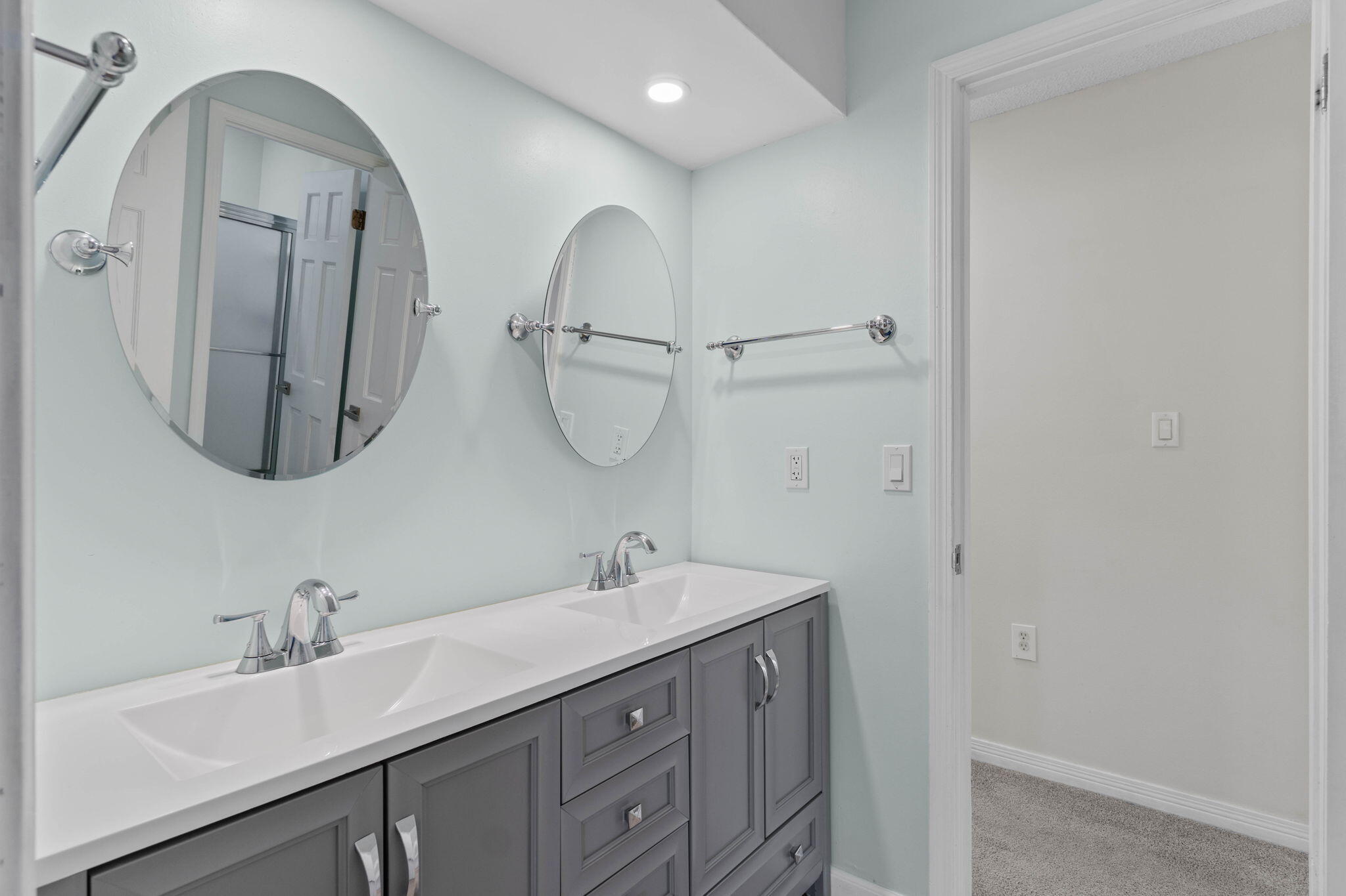 54 Country Club Road Shalimar, FL 32579 - Photo 34 of 58 a bathroom with a double vanity sink and a mirror