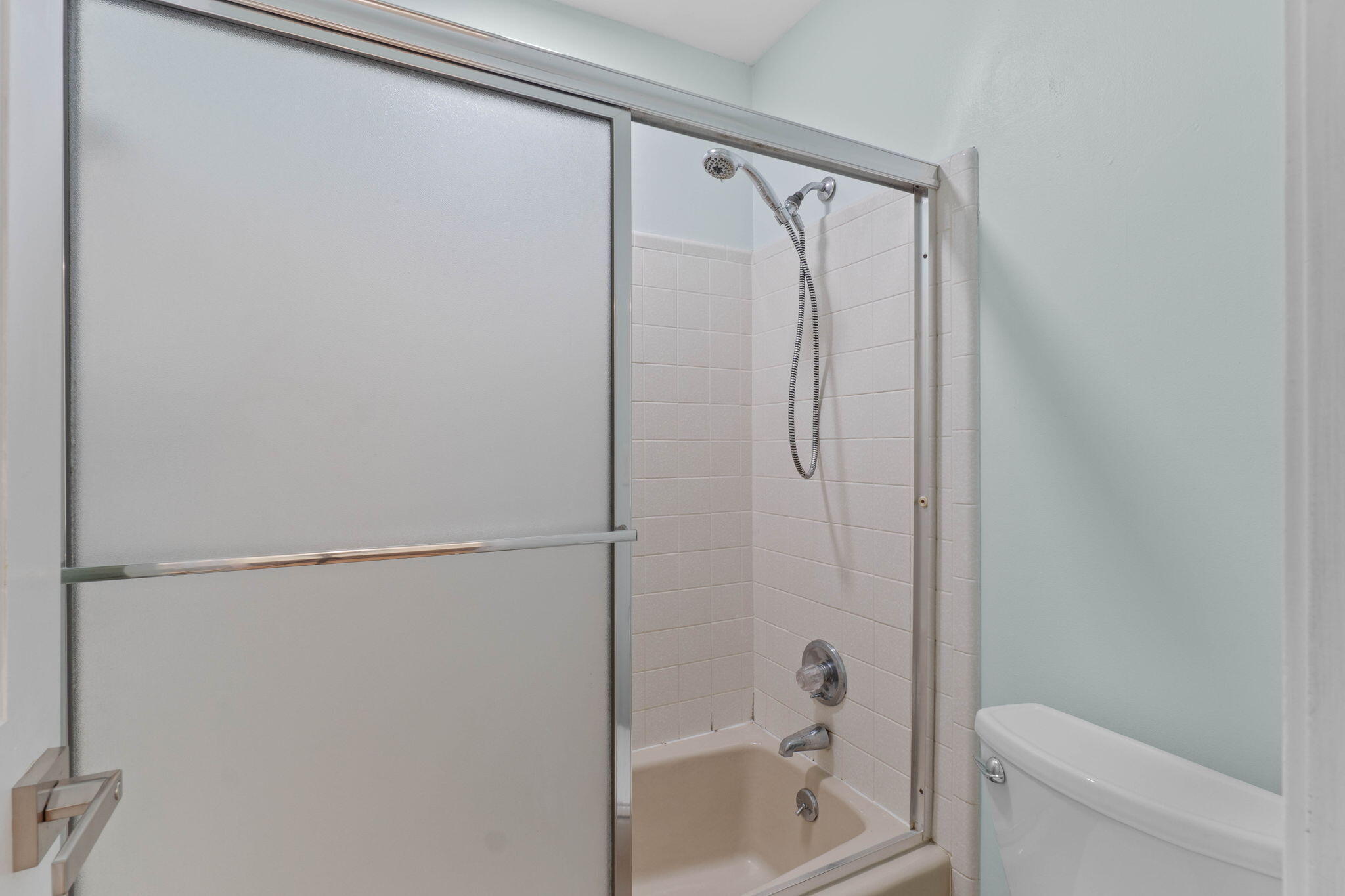 54 Country Club Road Shalimar, FL 32579 - Photo 36 of 58 a bathroom with a shower and a toilet