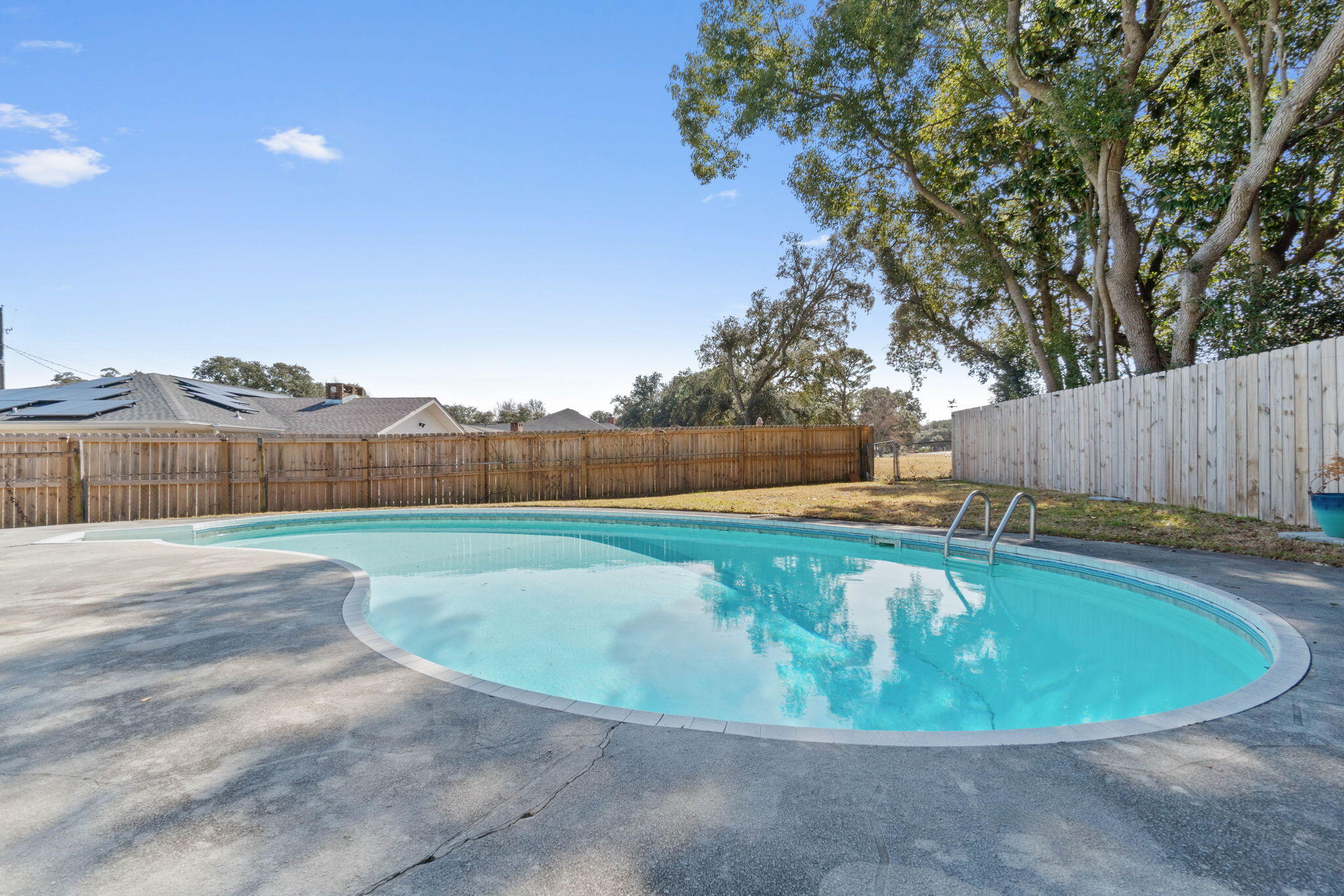 54 Country Club Road Shalimar, FL 32579 - Photo 42 of 58 a view of a swimming pool