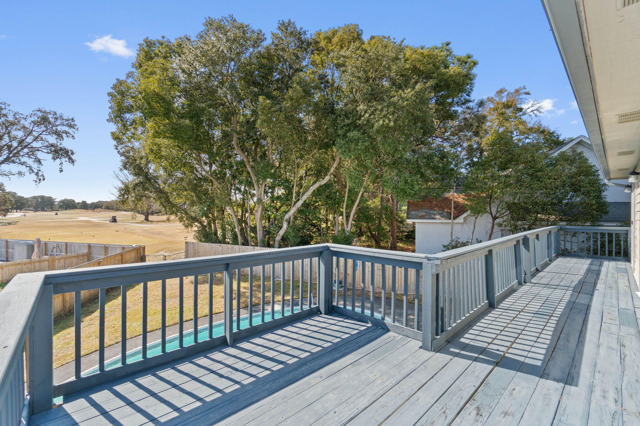 54 Country Club Road Shalimar, FL 32579 - Photo 45 of 58 a view of balcony with wooden floor and fence