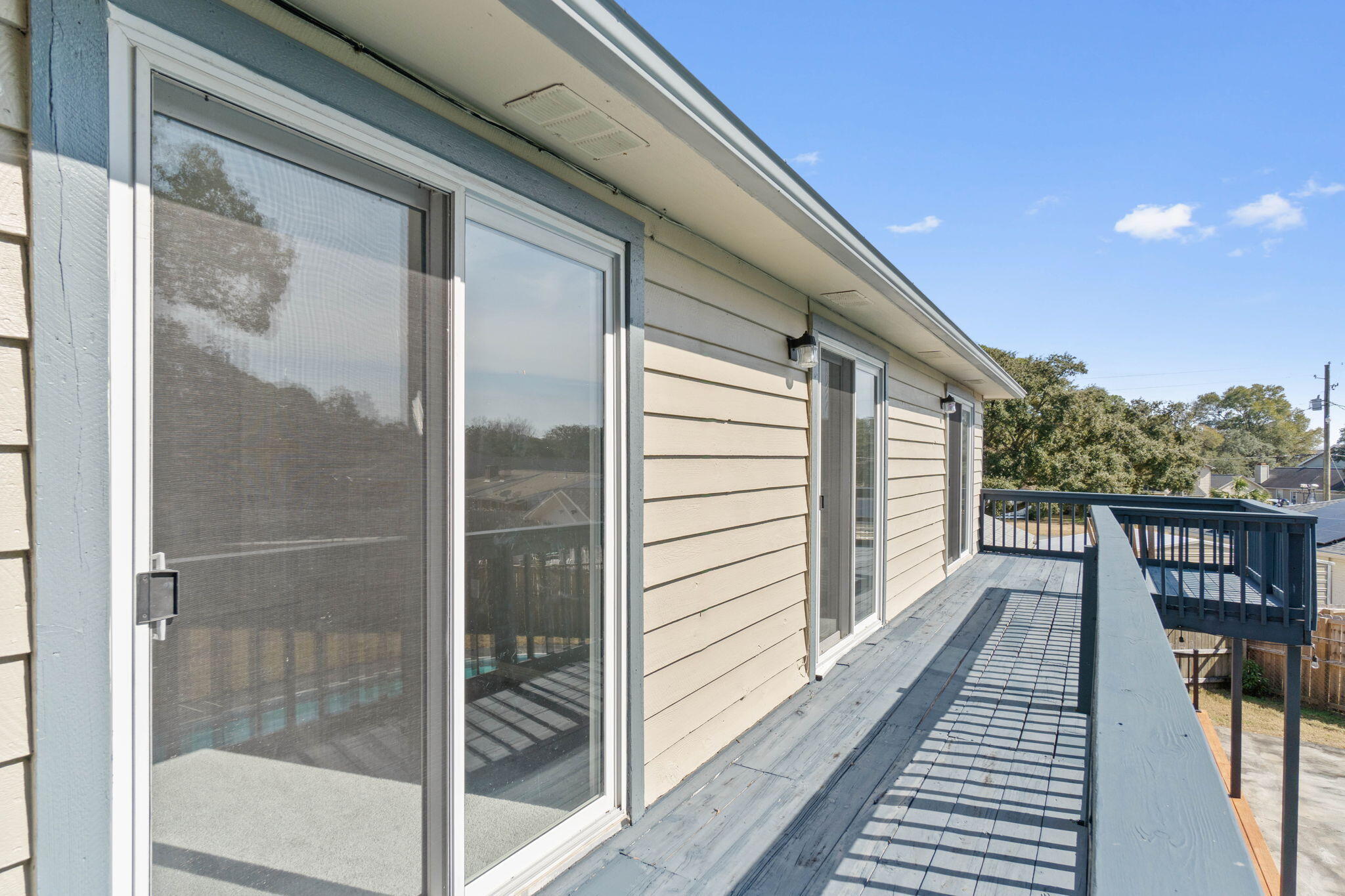 54 Country Club Road Shalimar, FL 32579 - Photo 46 of 58 a view of a balcony with wooden floor