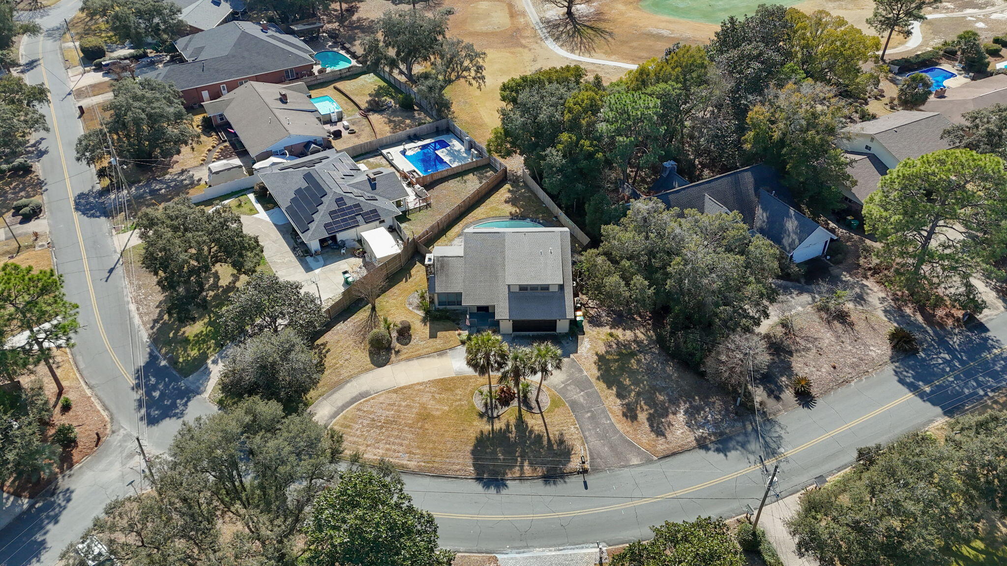 54 Country Club Road Shalimar, FL 32579 - Photo 47 of 58 an aerial view of a house with a yard and fountain