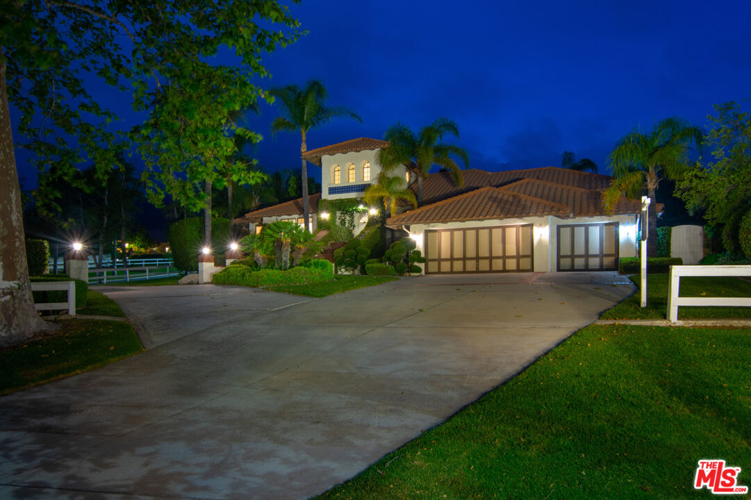 10560 Boulder Canyon Road Rancho Cucamonga, CA 91737 - Photo 2 of 30 a front view of a house with a yard