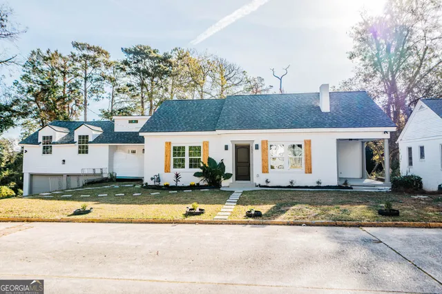 a view of a house with a swimming pool