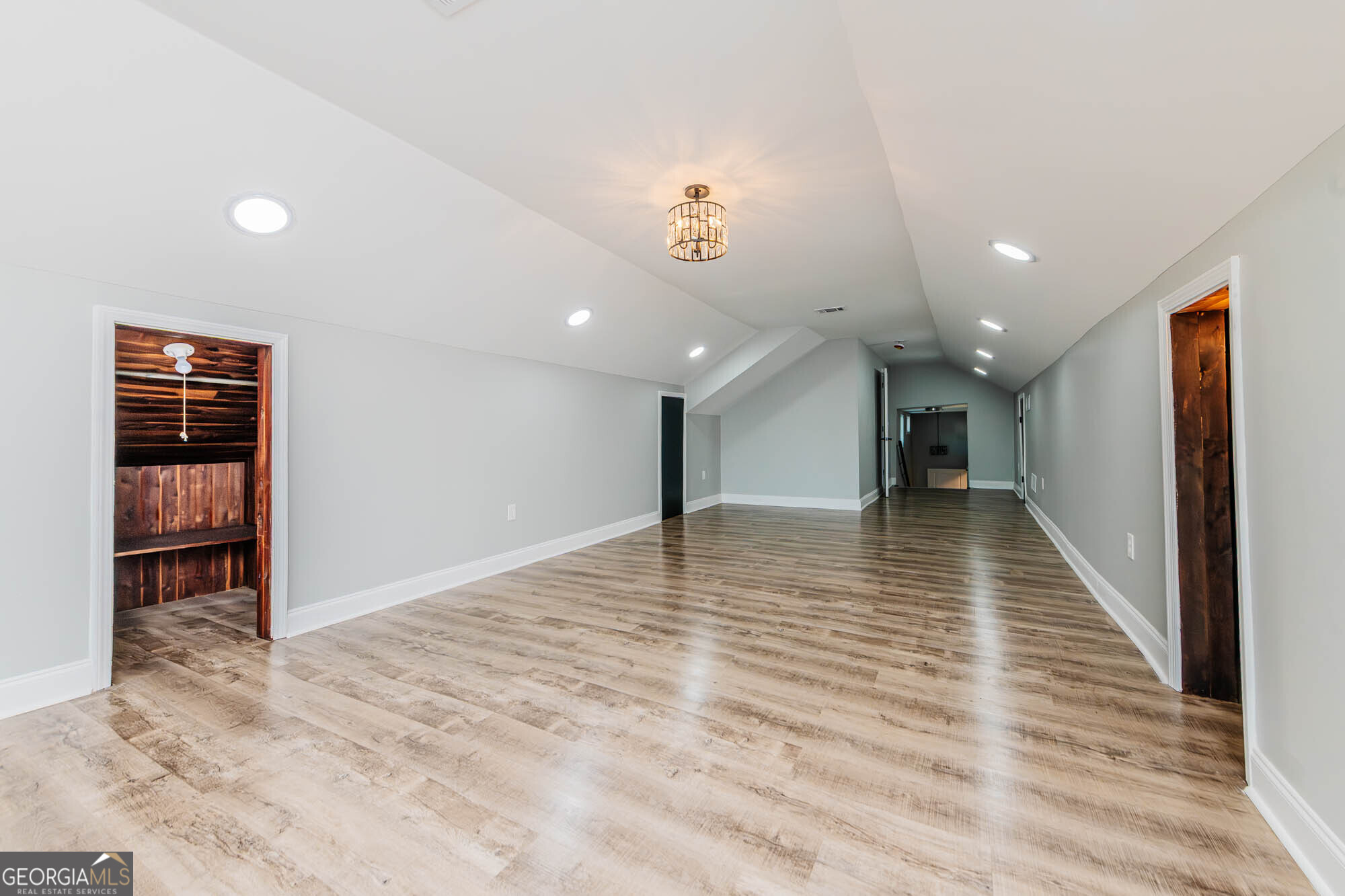 151 Culver Street Macon, GA 31204 - Photo 11 of 29 a view of a hallway with wooden floor and staircase