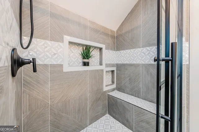 a view of a livingroom with wooden floor and closet