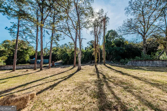 a view of a house with basketball court