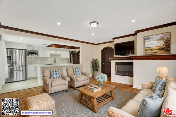a living room with furniture and a rug