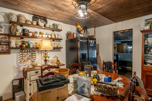 a bunch of street signs outside the stores