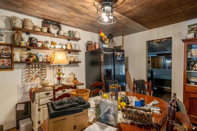 a bunch of street signs outside the stores