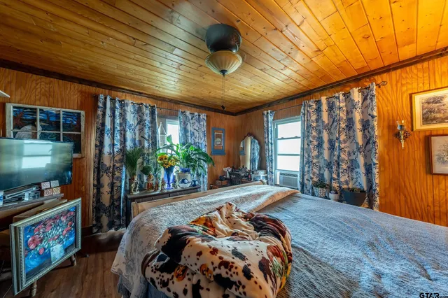 a view of balcony with furniture and wooden floor