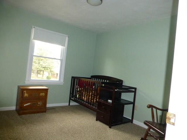 3453 Wedgewood Road Southwest Roanoke, VA 24018 - Photo 14 of 38 a room with a dresser and a window