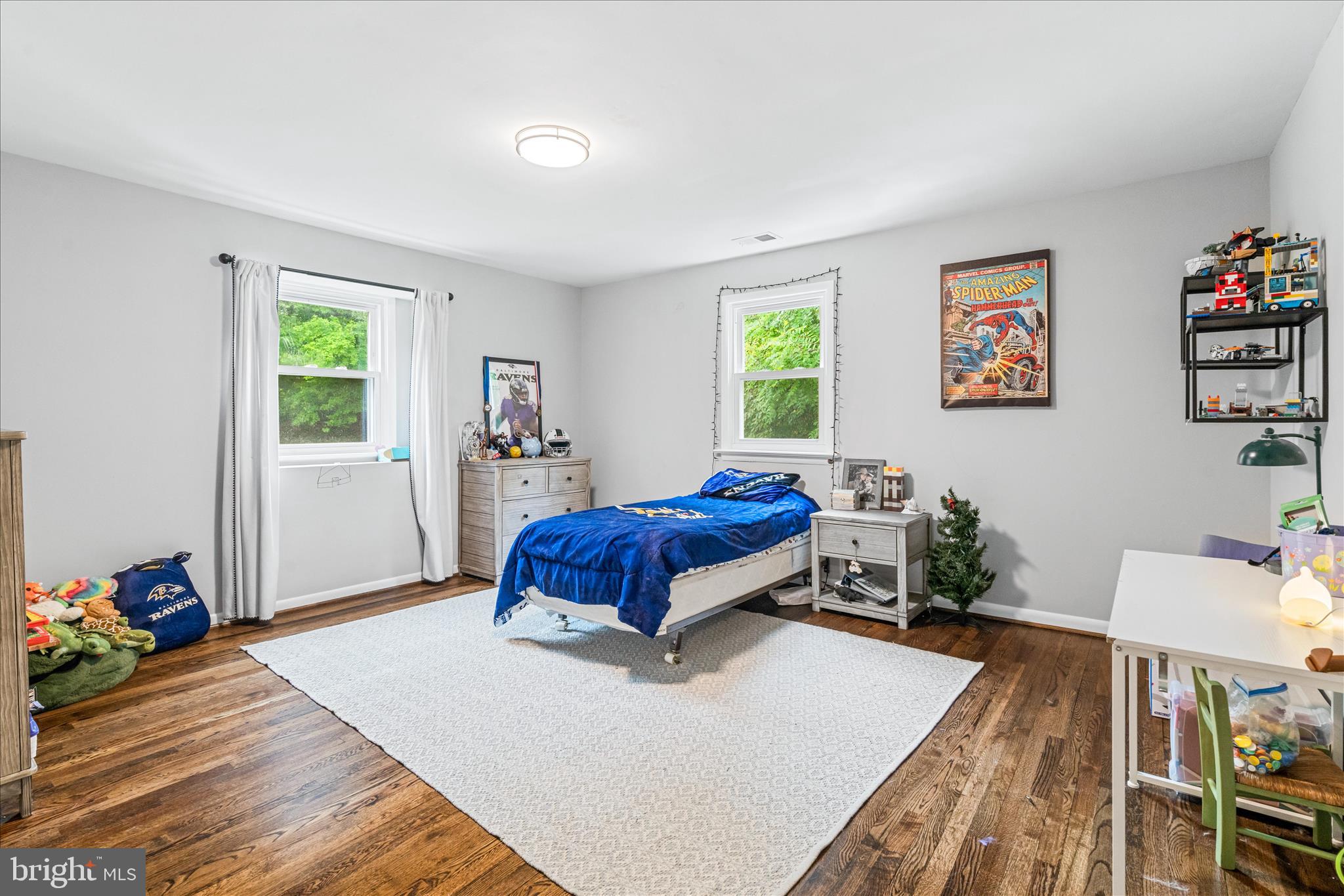 4217 Bill Moxley Road Mount Airy, MD 21771 - Photo 29 of 57 a bedroom with a bed and wooden floor