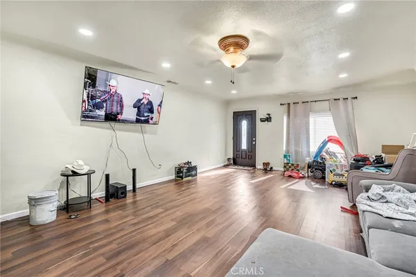 a view of a room with gym equipment and a large window