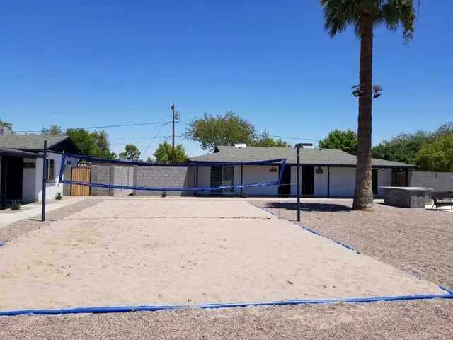a house with a wooden fence